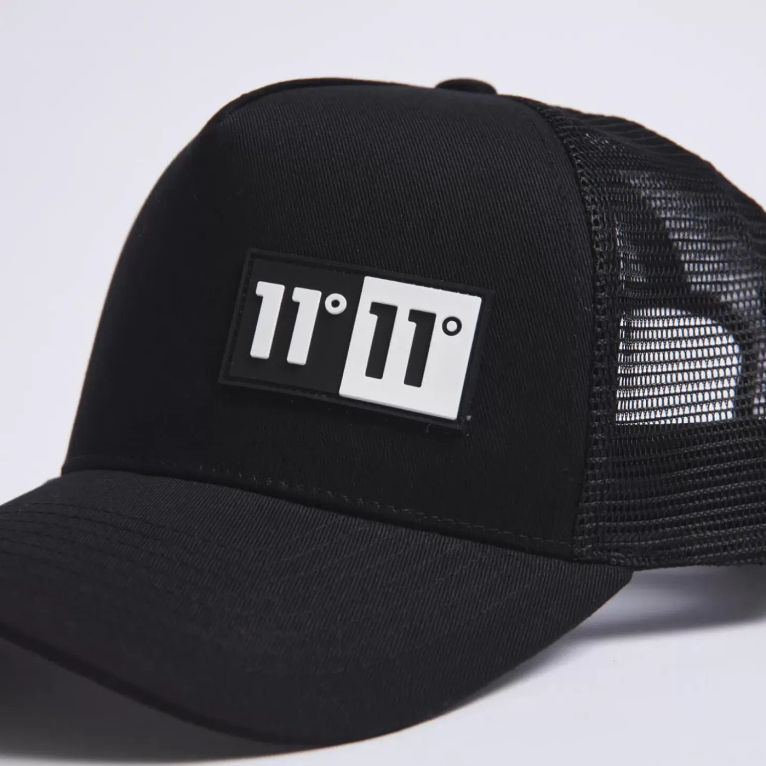 11 Degrees Domino Trucker Cap – Black