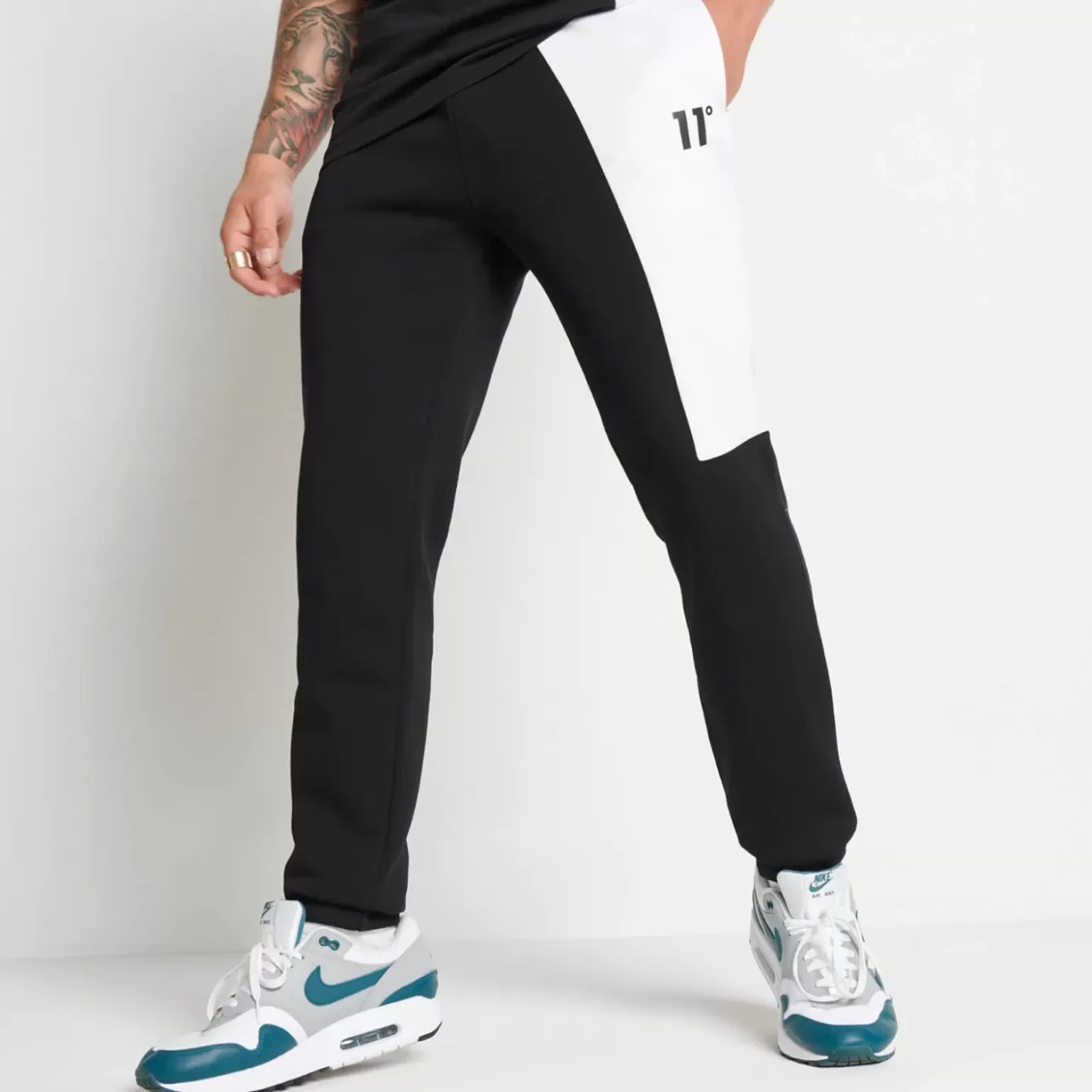 11 Degrees Mixed Fabric Cut And Sew Joggers Regular Fit – Black / White