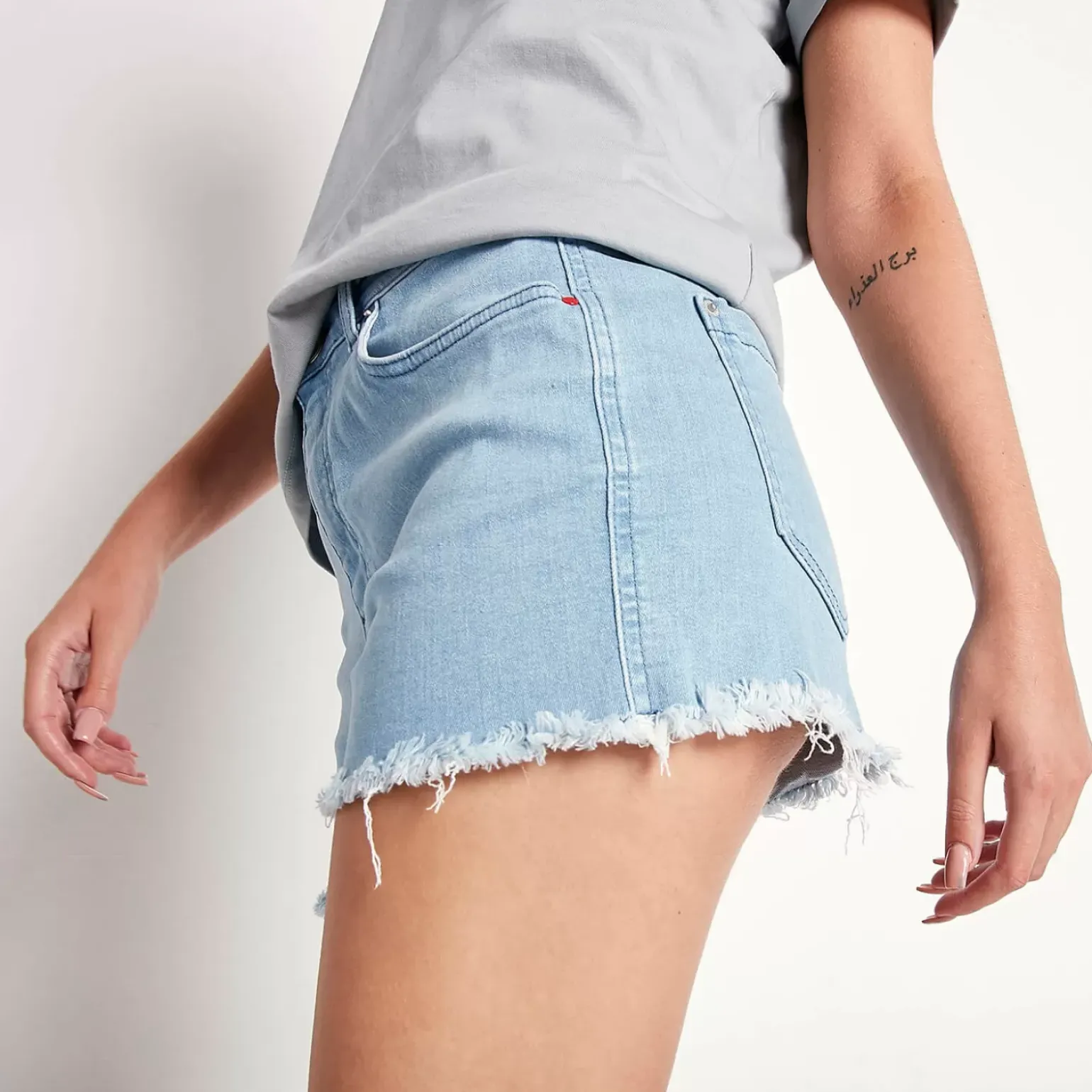11 Degrees Womens Sustainable High Waisted Raw Hem Denim Shorts – Light Blue Wash