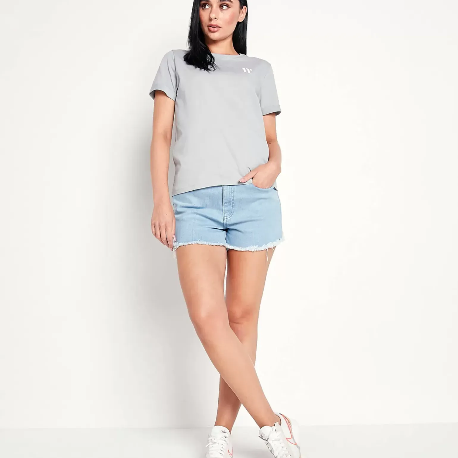 11 Degrees Womens Sustainable High Waisted Raw Hem Denim Shorts – Light Blue Wash